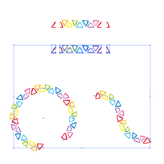 虹色にラフな三角形が並ぶイラレ・パターンブラシ